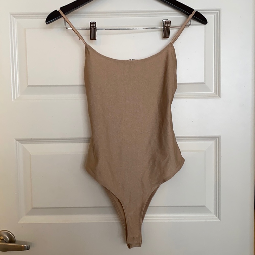 Forever 21 silky nude stretch bodysuit.